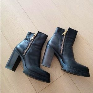 Steve Madden black leather high heel boots with side zippers